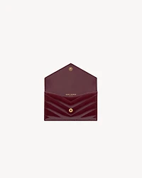 CASSANDRE MATELASSÉ FRAGMENTS flap card case in patent leather