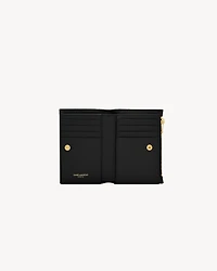 CASSANDRE MATELASSÉ Fragments bi-fold wallet in grain de poudre leather