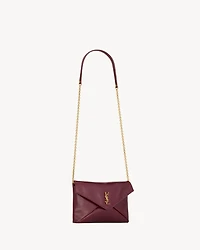 CASSANDRE chain pouch in shiny leather