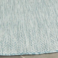 Safavieh Courtyard Collection Katelyn Geometric Indoor/Outdoor Round Area Rug