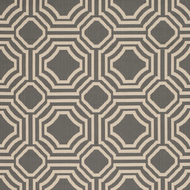 Safavieh Courtyard Collection Torma Geometric Indoor/Outdoor Round Area Rug