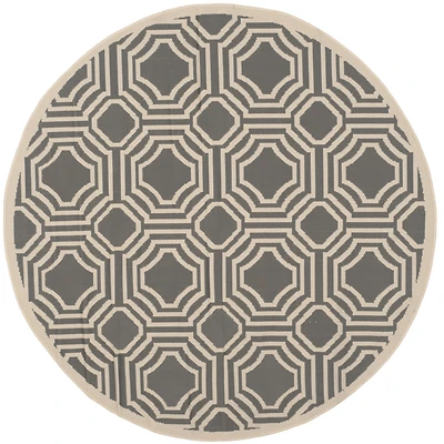 Safavieh Courtyard Collection Torma Geometric Indoor/Outdoor Round Area Rug