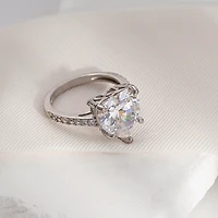 Diamonart Womens Cubic Zirconia Sterling Silver Heart Side Stone Engagement Ring