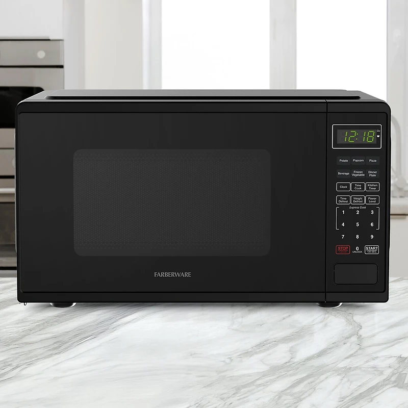 Farberware 0.9 Cu. Ft. 900 Watt Counter Microwave Oven