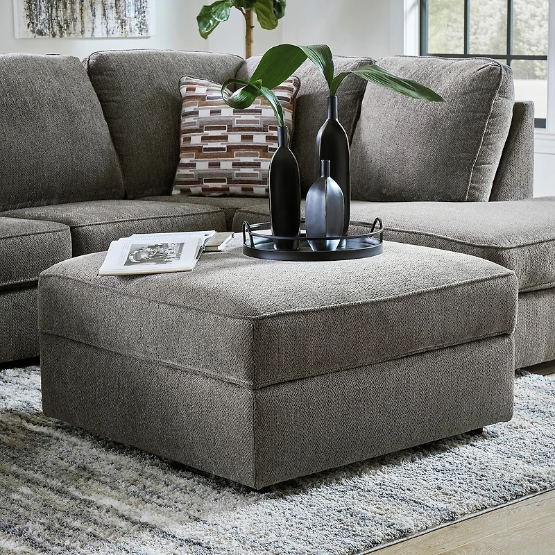 Signature Design by Ashley® O'Phannon Cushioned Storage Ottoman in Putty Brown
