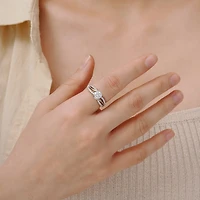 Diamonart Womens Cubic Zirconia Sterling Silver Round Crossover Side Stone Promise Ring