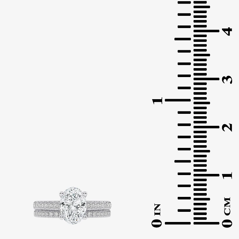 (H-I / Si2-I1) Womens 1 1/2 CT. T.W. Lab Grown White Diamond 10K or 14K Gold Oval Side Stone Bridal Set