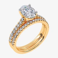 (H-I / Si2-I1) Womens 1 1/2 CT. T.W. Lab Grown White Diamond 10K or 14K Gold Oval Side Stone Bridal Set