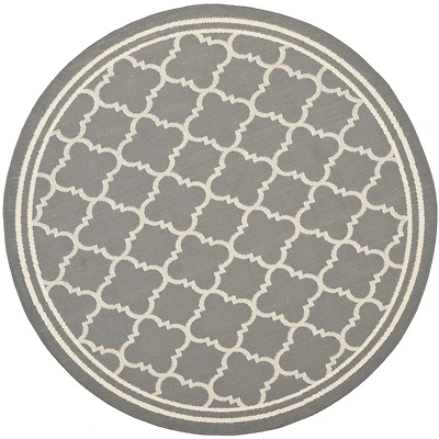 Safavieh Courtyard Collection Crispian Geometric Indoor/Outdoor Round Area Rug