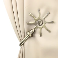 Rod Desyne Decorative Holdbacks with Sun Finial