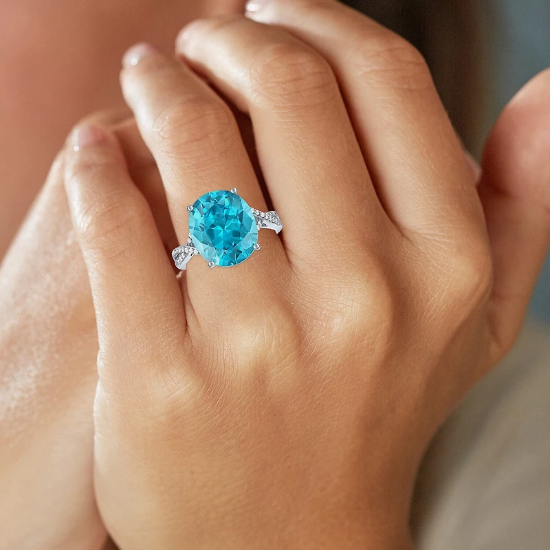 Womens Genuine Blue Topaz Sterling Silver Oval Side Stone Cocktail Ring