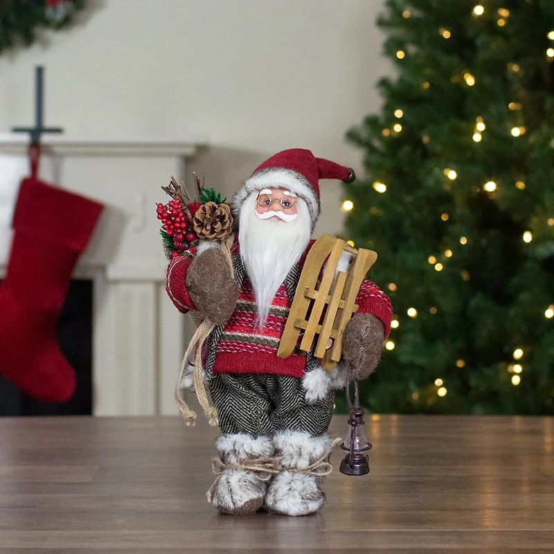 Northlight 12" Standing Santa With A Sled And Lantern Christmas Figurine