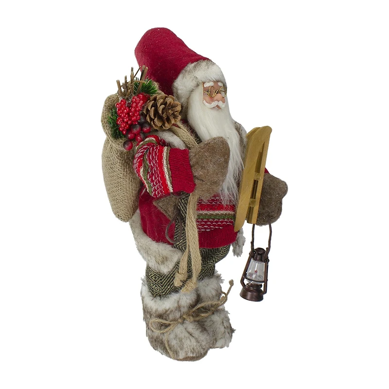 Northlight 12" Standing Santa With A Sled And Lantern Christmas Figurine