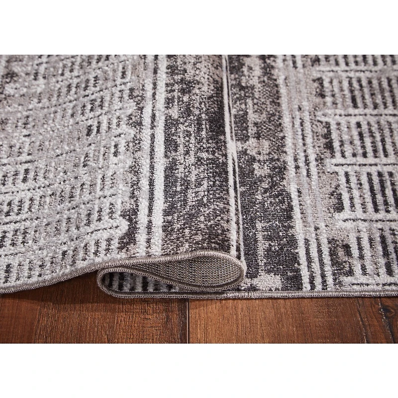 Signature Design by Ashley® Henchester Washable Indoor Rectangular Area Rug