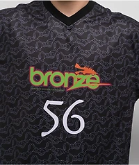 Bronze 56K Trust Black Soccer Jersey