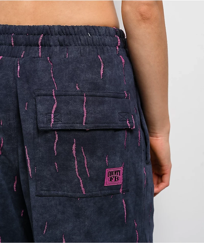 FB County Ripped Up Black Wash Sweatpants