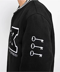 Key Street Lock And Black Varsity Jacket