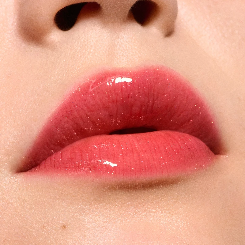 Blowing Air Kisses Glossy Lips Duo ($70 Value)