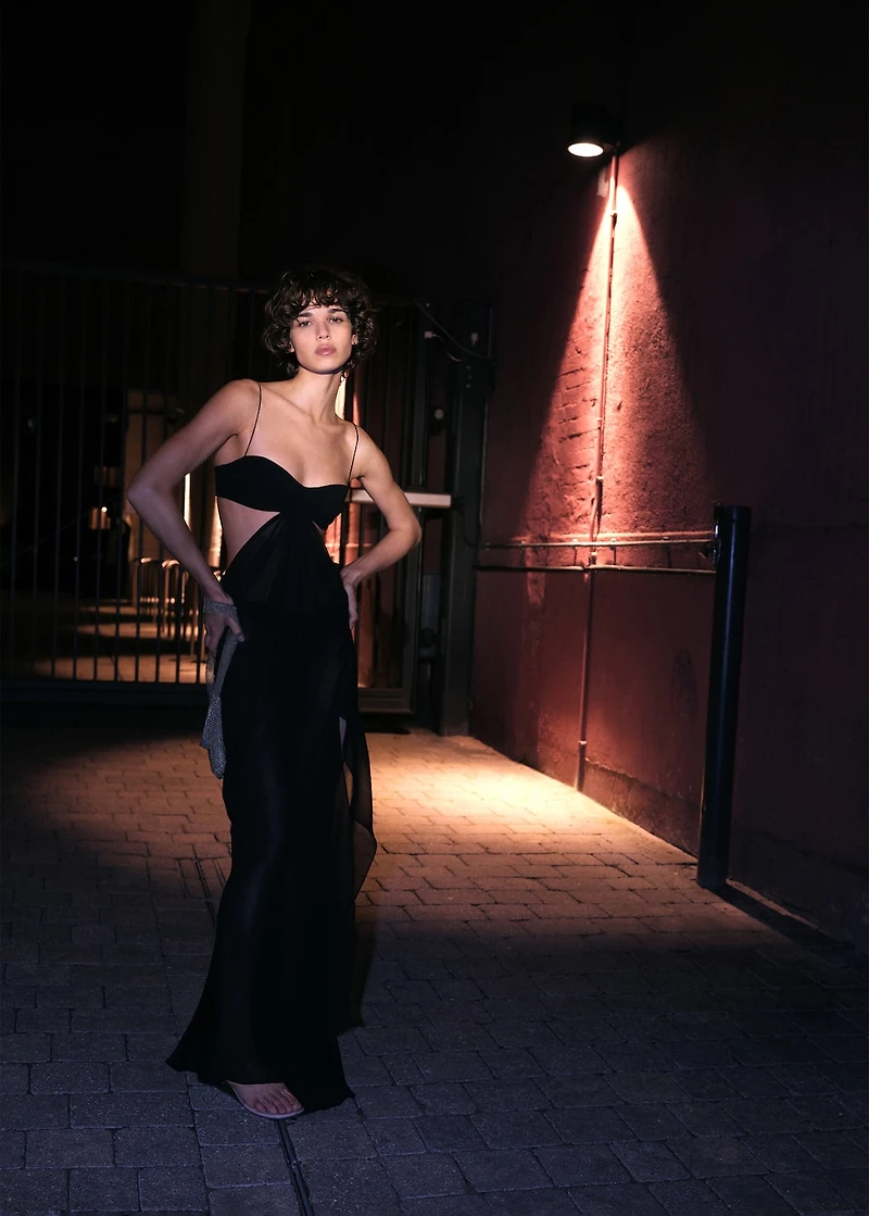 Dress with asymmetrical hem and cut-out