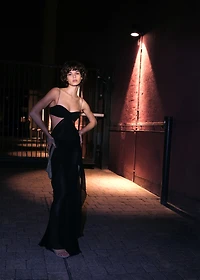 Dress with asymmetrical hem and cut-out