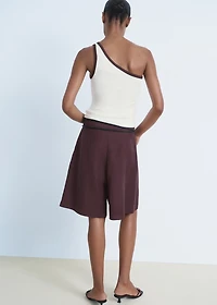 Asymmetrical top with contrasting trim