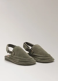 Leather slippers with shearling lining