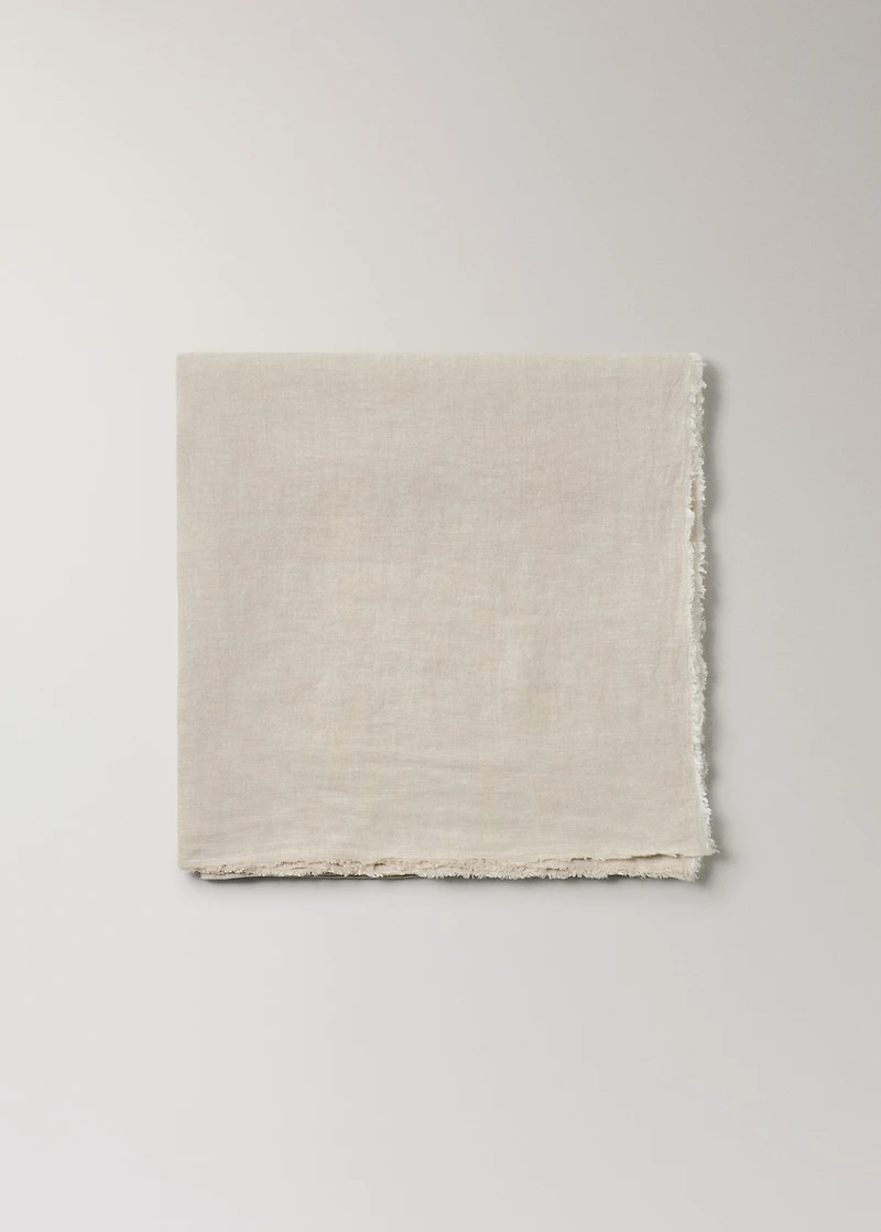 Linen tablecloth with frayed ends for 6 to 8 diners