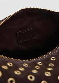 Suede shoulder bag with eyelets
