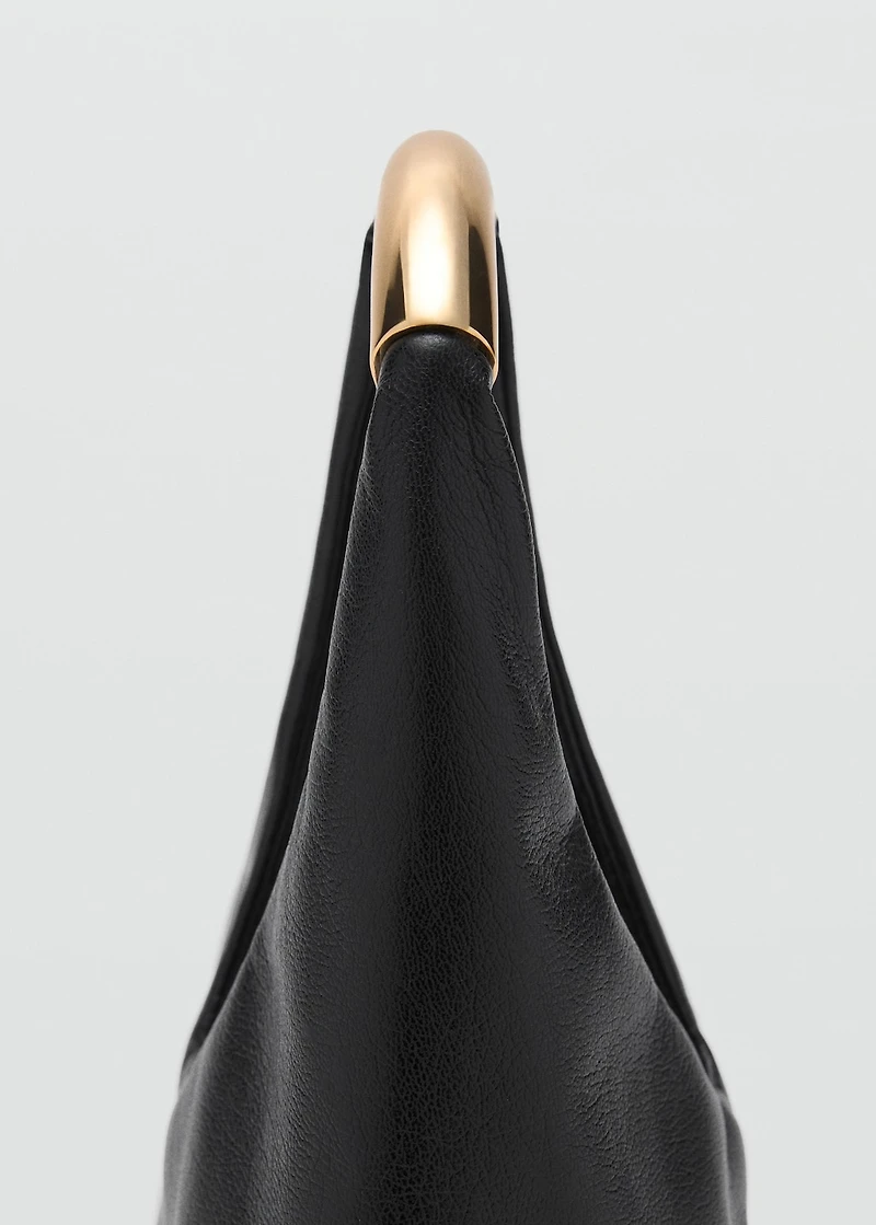 Handbag with metal handle