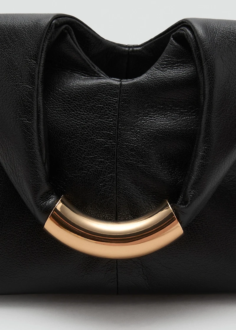 Handbag with metal handle