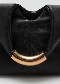 Handbag with metal handle