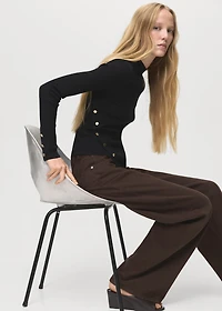 Asymmetrical sweater with buttons