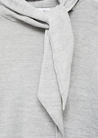 Turtleneck sweater with knot