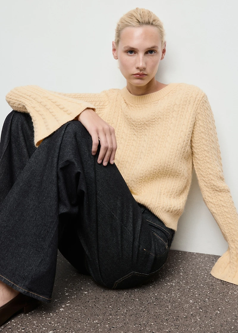 Cable-knit sweater with flared sleeves