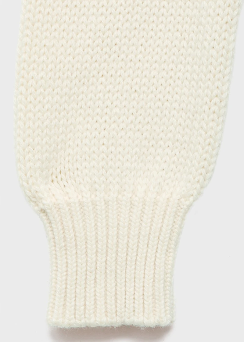 Knitted sweater with tie slits