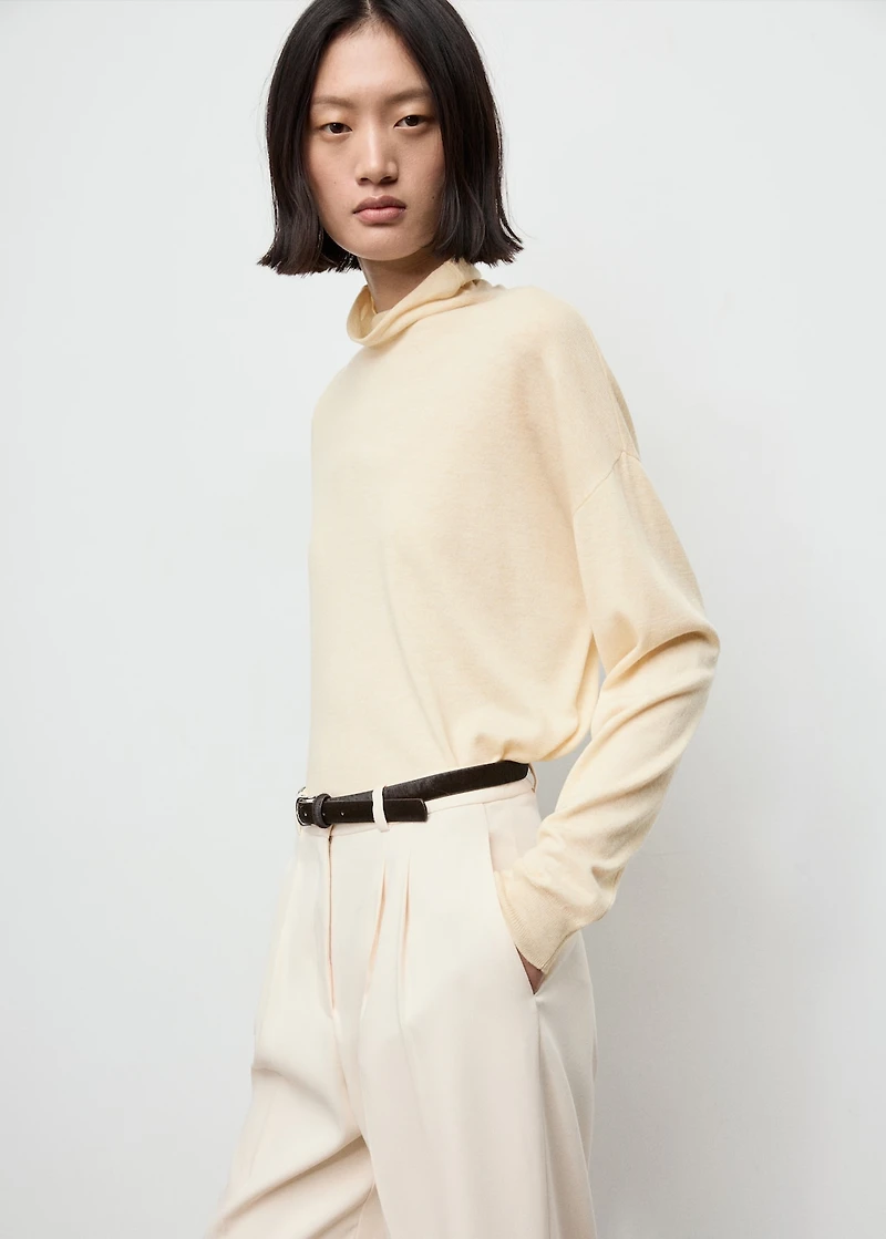 Cable-knit turtleneck sweater