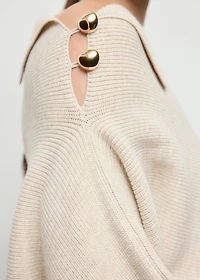 Sweater with asymmetrical neck and jewel buttons
