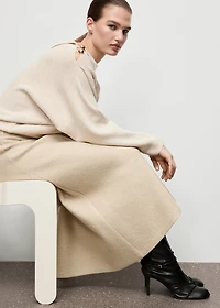 Sweater with asymmetrical neck and jewel buttons