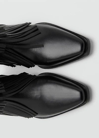 Leather ankle boot with fringe heel