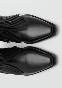 Leather ankle boot with fringe heel