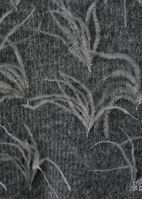 Knitted sweater with feathers