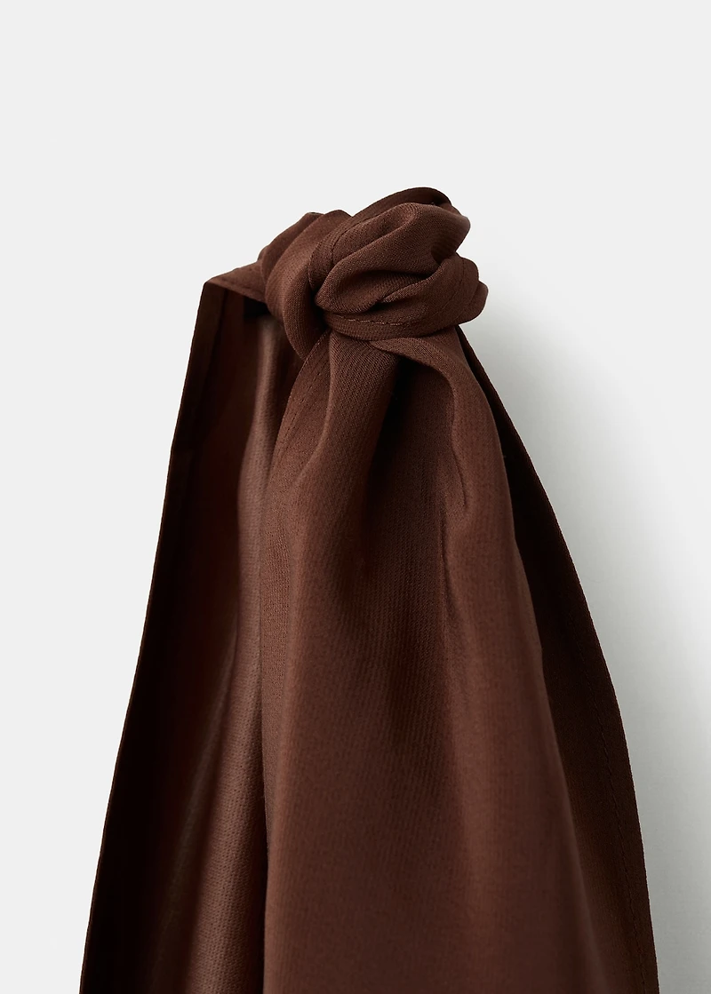 Asymmetrical dress with knot strap