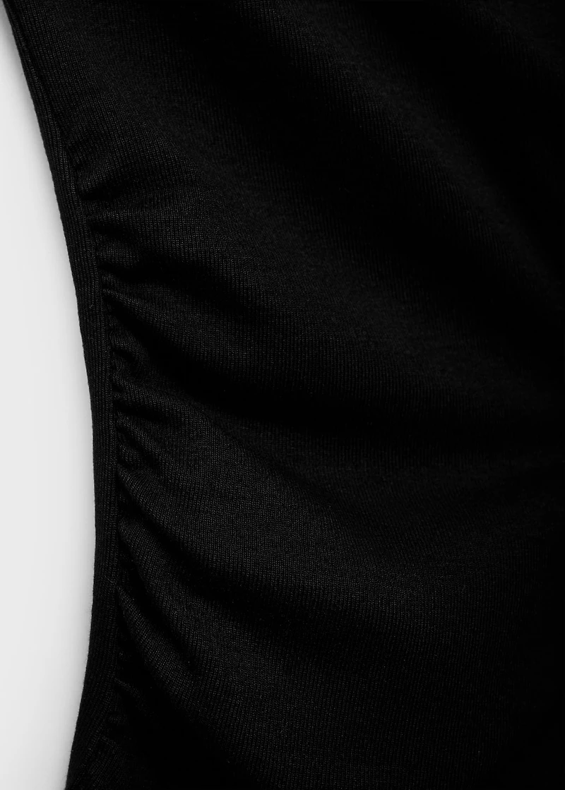 Cotton top with asymmetrical neckline