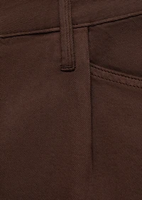 Denim shorts with frayed hem and pleats