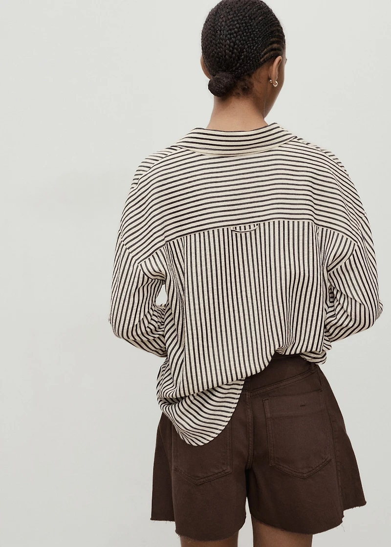 Denim shorts with frayed hem and pleats