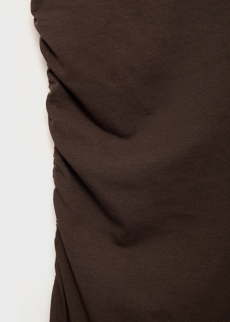 Asymmetrical dress with gathered strap