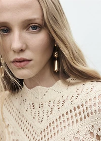 Knitted sweater with lace accents