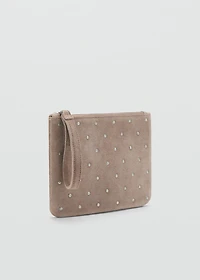 Studded clutch bag