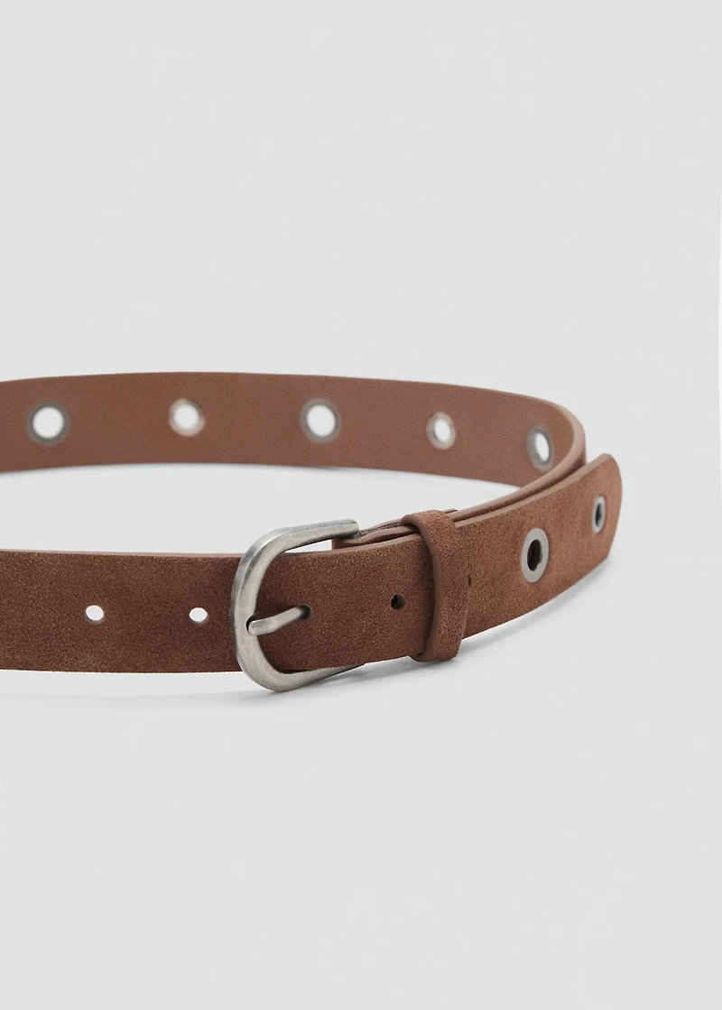 Belt with metal eyelets