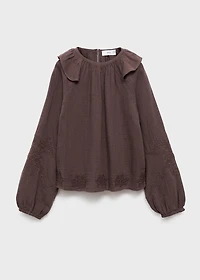 Ruffled embroidered blouse